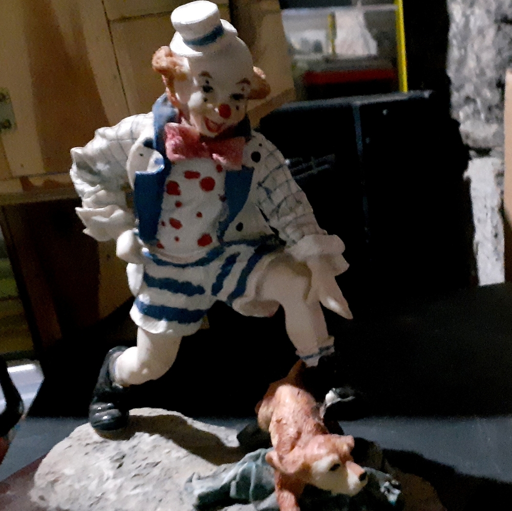 clown and dog figurine